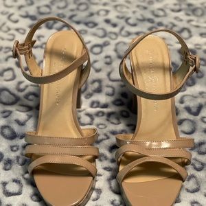 Strapy, Buckle on the side, tan heels. Great condition, only worn about 3 times.